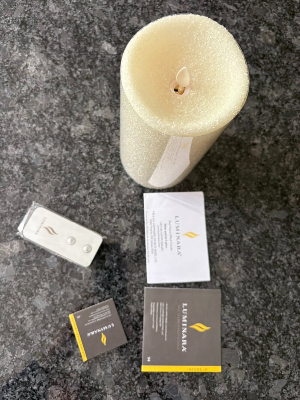 New in box, Ivory Gitter Luminara Real Flame-Effect Candle with Remote - 7" tall